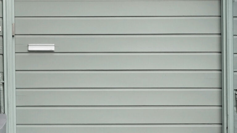 How do I know if my garage door is misaligned
