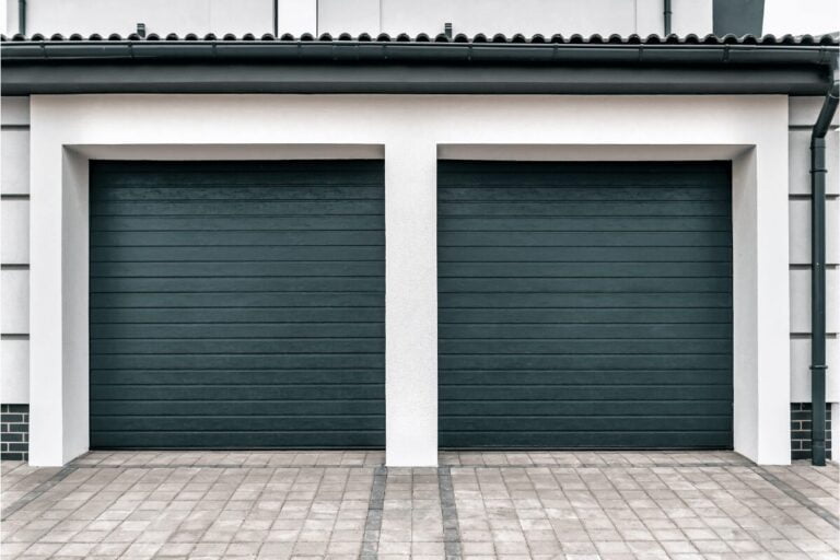 Can you install a new garage door on old tracks