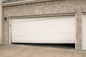 How long does it take to remove and replace a garage door