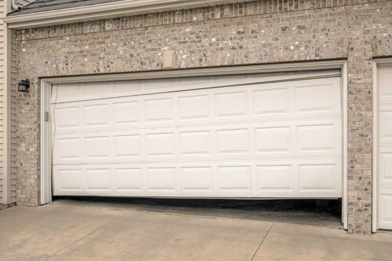 How long does it take to remove and replace a garage door