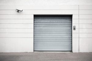What is the cheapest way to replace a garage door
