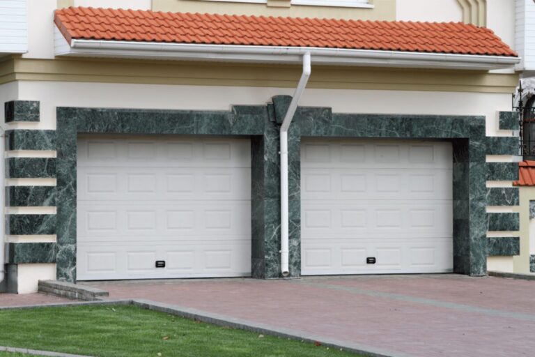 Why does my garage door go down 2 feet then back up